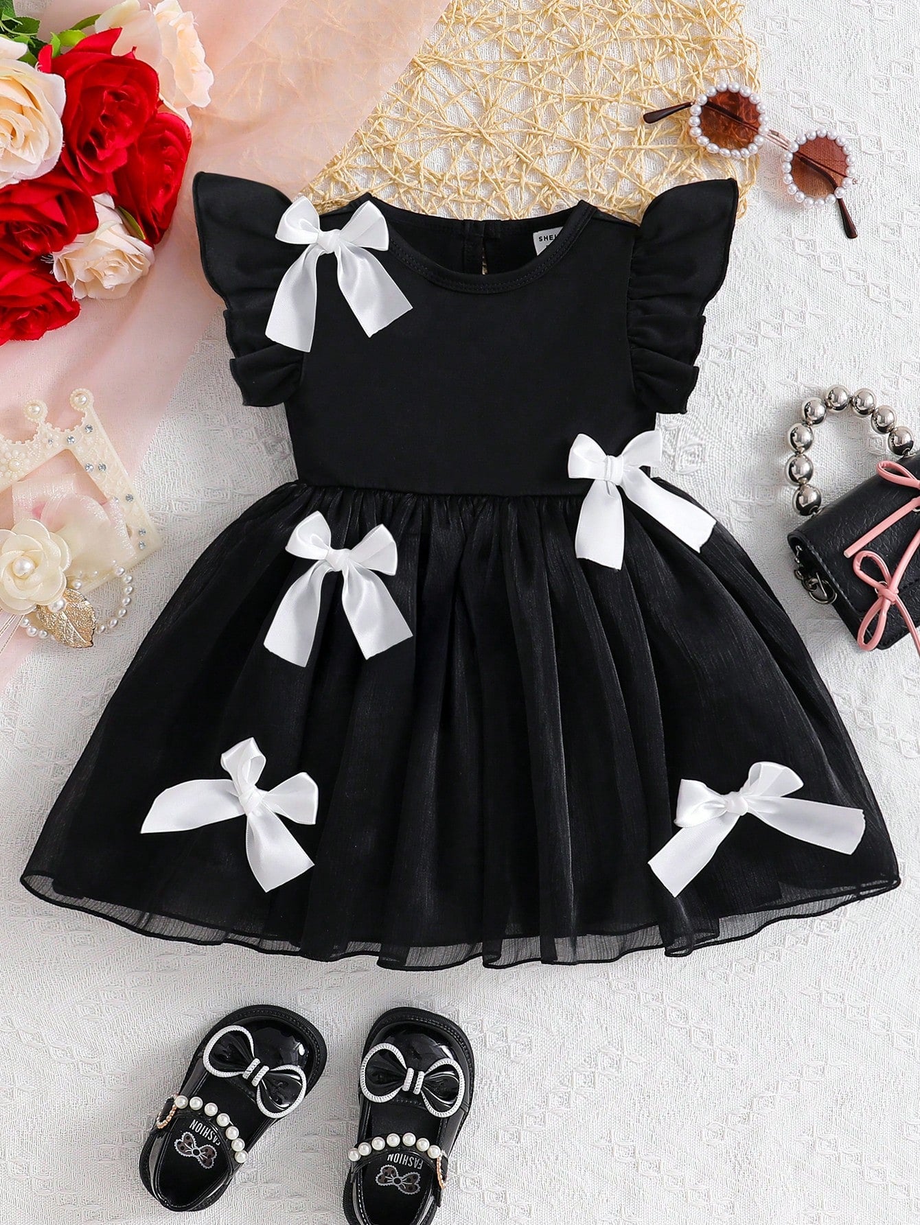 SHEIN Baby Girl Elegant Sweet Casual Black & White Dress For Spring/Summer, Combining Classic Black & White With Adorable Details Like 3D Bow & Ruffle Sleeves