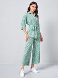  | SHEIN Clasi Collared Self Belted Allover Print Blouse & Wide Leg Pants Set | Top and Pant Set | Shein | OneHub